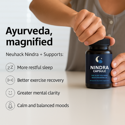 Person holding a bottle of NINDRA capsules with product details on a light background